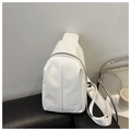 Close-up of minimalist white PU leather crossbody bag with vertical pleated details - White