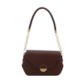 Vintage burgundy leather crossbody bag with round gold buckle and chain strap - Brown