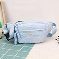 Light blue quilted chest bag with wavy embroidery and adjustable nylon strap - Blue