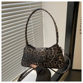 Detail showing leopard print shoulder bag with short strap and textured finish - Coffee