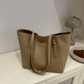 Minimalist beige large tote bag in polished faux leather with adjustable shoulder straps - Khaki