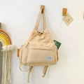 Minimalistische beige canvas rugzak met trekkoordsluiting en grote opslagcapaciteit - Khaki