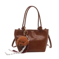 Vintage brown leather tote bag with poodle plush charm and woven rope tassel detail - Brown With Pendant