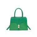 Dark green faux crocodile leather handbag with vintage gold buckle on white background - Green