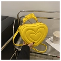 Bright yellow heart-shaped crossbody bag with ruffled handle and gold metal zipper - Yellow
