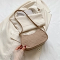 Quilted felt baguette shoulder bag in beige featuring geometric patterns and minimalist style - Khaki