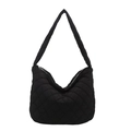 Minimalist black quilted puffer shoulder bag with diamond pattern and zipper closure - Black