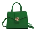 Grüne Damen Handtasche aus Leder mit Kleeblatt-Verschluss und Schultergurt in Studio - Grün