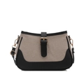 Bolso bandolera minimalista de lona y cuero con herrajes dorados sobre fondo blanco - Negro