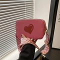 Pink heart print crossbody bag with lychee texture and wide geometric shoulder strap - Pink