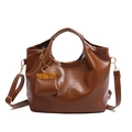Brown PU leather tote bag with top handle, detachable strap, and mini bag charm - Brown