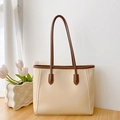 Beige and brown tote bag with long handles and vertical stitching on a wooden table - No Pendant / Off White