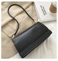 Elegant black crossbody bag with crocodile pattern and smooth leather, gold hardware - Black