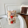Detail of plush cookie phone grip with cute embroidery on a vintage mirror surface - Plush Square Cheese