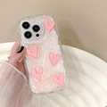 Detailed view of pink 3D heart charms on a pearlescent wavy iPhone case surface - Pink Wrinkled Heart / iPhone 7/8/SE 2020
