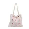White corduroy tote bag with red letter embroidery and dual shoulder straps - White