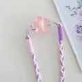 Close-up of woven tricolor lanyard with purple and pink threads and acrylic flower charm - Braided Three-Strand Rope (With Back Clip) / Pink