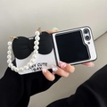 Detail of white textured Z Flip case with large black bow and pearl handle strap - Black / OPPO Find n3 Flip