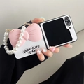 Detail of pink bow and pearl strap on white leather case for Samsung Z Flip series - Pink / OPPO Find n3 Flip