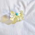 Sweet yellow bow hair clip with blue bead detail on a soft textured white fabric - Bow Back Clip Only / Yellow