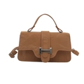 Tan retro faux leather handbag with textured finish and silver metallic buckle closure - Brown