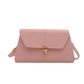 Minimalist light pink rectangular crossbody bag with elegant gold metal ring clasp - Pink