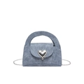 Chic Morandi blue suede handbag featuring a silver heart-shaped clasp and chain strap - Blue