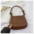 Detail of matte brown leather shoulder bag with knotted handle and golden hardware - Tan