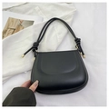 Detail of black matte leather shoulder bag with knotted strap and gold metal accents - Black