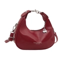 Retro red crescent shoulder bag in glossy leather with clover charm on white background - Black