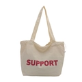 Beige Canvas-Tragetasche mit rotem SUPPORT-Schriftzug und praktischem Schultergurt - Weiß