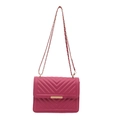 Magenta chevron quilted crossbody bag with gold chain strap on white background - Rose Pink