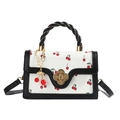 Cute cherry print crossbody bag with twisted handle and gold flower lock detail - Black