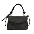 Bolso de mano gris oscuro con estampado de estrellas y asas de cuero anudadas - Estrella