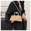 Chic beige geometric square bag with unique silver metal handle and shoulder strap - Khaki