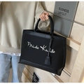 Large black canvas tote bag with Frido Kahlo lettering and leather trim detail - Black