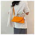 Minimalist orange square crossbody bag with sculptural silver handle for women - Orange