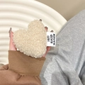 Detail of a beige plush heart-shaped phone grip made of soft faux sherpa wool fabric - Beige