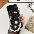 Detail of black pleated phone case with pearl chain and elegant charm ornaments - Black / Samsung ZFlip3