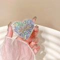 Nahaufnahme der herzförmigen Handyhalterung mit holografischem Glitter und Smile-Akzent - Transparenter Herz Treibsand Strass Smile