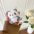 Close-up of a cute plush white bear phone grip with soft fur and pink blush details - Panda