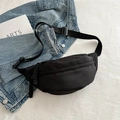 Minimalist black nylon crossbody moon bag with woven zipper detail and adjustable strap - Black