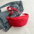 Minimalist bright red nylon waist bag with adjustable strap and red woven zipper puller - Red