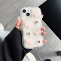 Gros plan de papillons roses pailletés et strass sur une coque iPhone nacrée - Style Papillon Rose / iPhone 7/8/SE 2020
