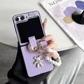 Detail of purple woven phone case for Z Flip with pearl chain and lucky bear charm - Purple