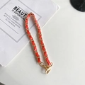 Modern gold metal chain with woven orange red leather and large lobster clasp - Short Handheld / Red
