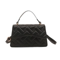 Chic black quilted crossbody bag with golden hardware and heart pattern embroidery details - Black
