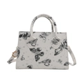 Borsa tote retrò con stampe di farfalle nere e tracolla regolabile su sfondo bianco - Grigio