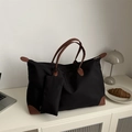 Grande borsa tote nera in tessuto Oxford con finiture in pelle marrone e bustina - Nero