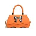 Sweet orange handbag with bow decoration and wavy flap design for women in 2024 - Orange
